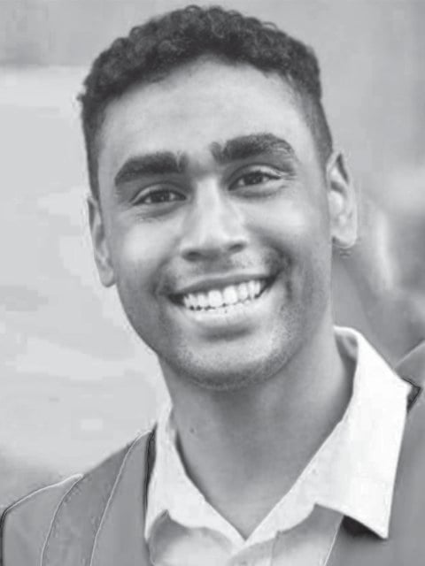 Smiling young man in a collared shirt
