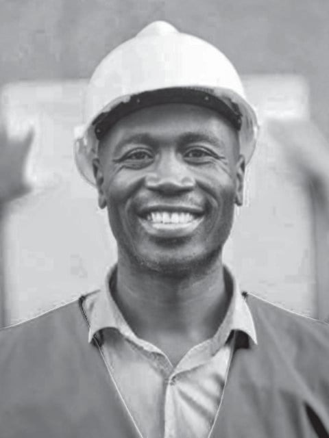Smiling worker in a hard hat
