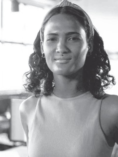 Smiling woman with curly hair